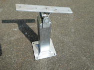 See-saw bearing with post and ground plate